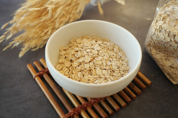 Nourishing and Wholesome Healthy Oats in a Bowl on a Rustic Background