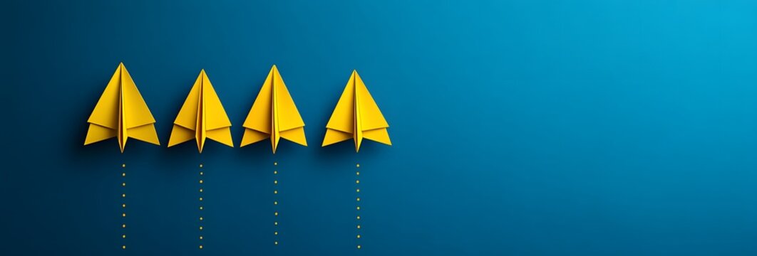 Yellow paper planes arranged in a sequence on a blue background, concept of growth and progress
