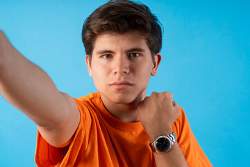 Young person expressing various emotions and body pains, pointing, using a cellphone, with colored...