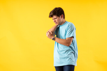 Young person expressing various emotions and body pains, pointing, using a cellphone, with colored...