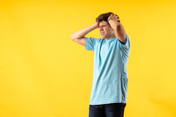 Young person expressing various emotions and body pains, pointing, using a cellphone, with colored...