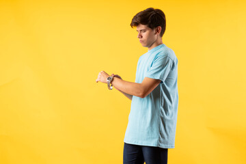 Young person expressing various emotions and body pains, pointing, using a cellphone, with colored...