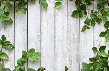 A wooden background adorned with green leaves, ideal for natural-themed designs.