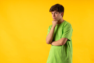 Young person expressing various emotions and body pains, pointing, using a cellphone, with colored...