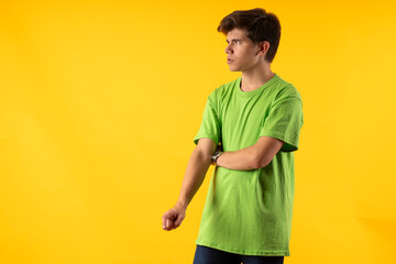 Young person expressing various emotions and body pains, pointing, using a cellphone, with colored...