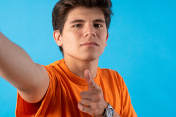 Young person expressing various emotions and body pains, pointing, using a cellphone, with colored...