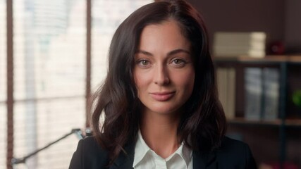 Confident Caucasian woman looking at camera smiling portrait female girl lady work businesswoman business office inside job employer manager leader femininity face professional millennial expression