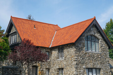 single house with stone wall