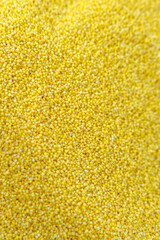 Vibrant Yellow Millet Grains for Culinary Creations and Health Benefits