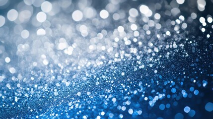 Fototapeta premium A creative abstract background featuring shimmering hues of silver and blue gradients