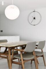 White kitchen furniture has a clean feel, is modern, and never goes out of style. It also goes well with wooden furniture