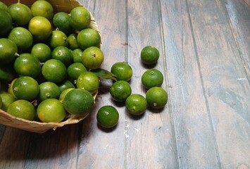 Fresh citrus on wooden background