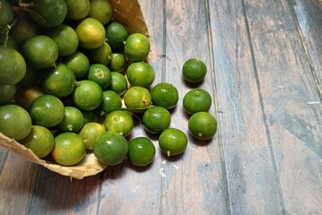 Fresh citrus on wooden background