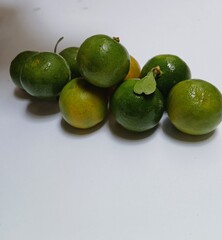 Fresh citrus on wooden background