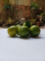 Fresh citrus on wooden background