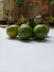 Fresh citrus on wooden background