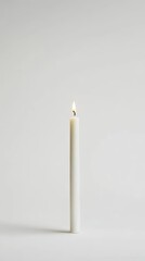 white candle on white background. Candle