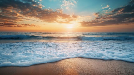 Fototapeta premium Serene sunset over the ocean, with waves gently crashing on the shore.