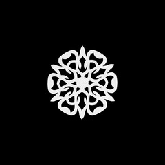 White paper handmade cut out snowflake isolated on black. Handmade new year decoration