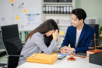 business people and lawyers discussing contract papers sitting at the table. Concepts of law, advice, legal services.