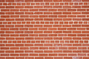 Background from a wall made of orange clinker bricks