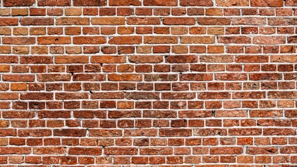 Closeup view of the red wall. Abstract pattern of a brick wall