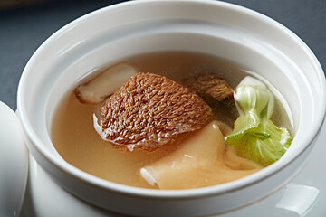 Hericium erinaceus, fish maw and hazel mushroom soup © 亮亮 徐