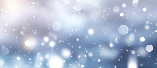 Obraz premium Soft bokeh of winter snowflakes and Christmas lights creating a serene holiday atmosphere in a blurred background