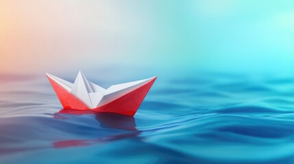 Obraz premium Red and white origami paper boat floating on serene water with a dreamy blue gradient background