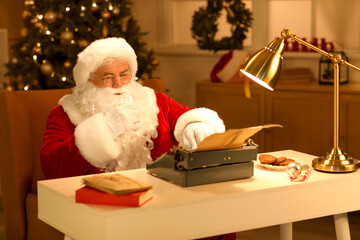 Santa Claus with typewriter drinking milk while writing Christmas story at night