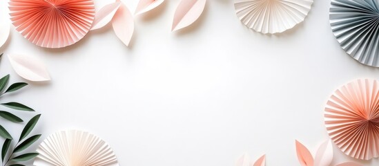 Elegant frame of paper fans and leaves against a white backdrop ideal for banners celebrating memorial occasions with ample copy space.