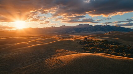 Obraz premium Vast Expanse of Golden Dunes Under a Beautiful Sunset Sky