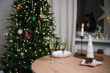Enjoying Celebratory Drinks And Cheers Together By The Christmas Tree In Joyful Festivity