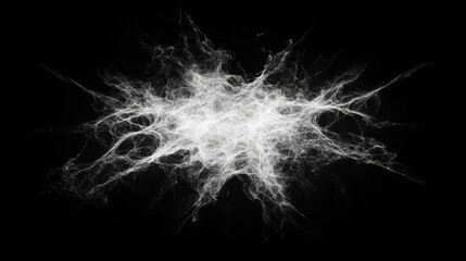 Abstract white powder explosion on black background creating dust particles and texture for artistic or design purposes
