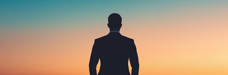 Businessman silhouettes concept. A silhouette of a businessman against a beautiful sunset horizon.