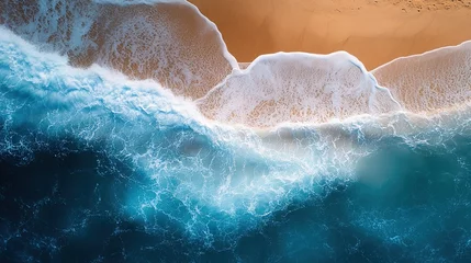 Gardinen Waves gently crashing on a sandy beach during a sunny day at a coastal location © melvilsky