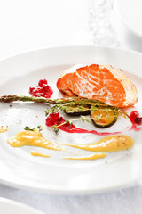 salmon steak with vegetables on Christmas table