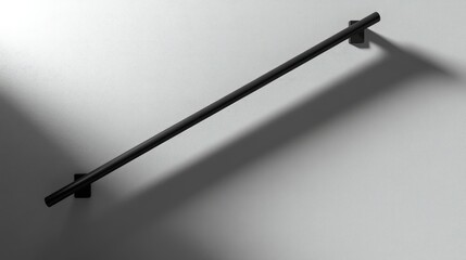 Abstract shadow of a handrail on a textured wall creating a minimalist aesthetic in contemporary interior design.