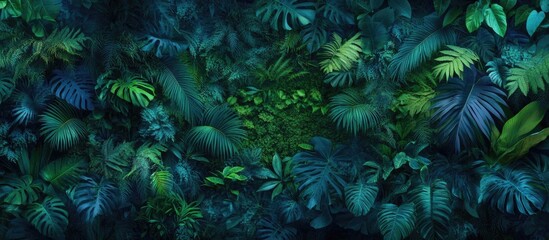 Fototapeta premium Lush green wall featuring diverse plants and flowers creating a vibrant outdoor living space emphasizing nature's beauty and ecosystem harmony