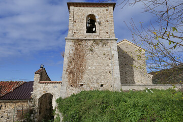 Fototapeta premium The bell tower of a church in Corleto Monforte, a small town in the province of Salerno, Italy.