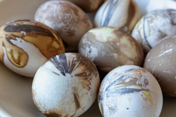 
Musty chocolate colored Easter eggs in a bowl