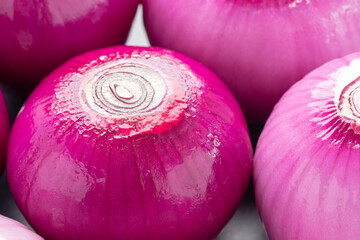 Close-up Of Fresh Peeled Whole Red Onion