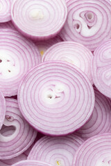 Top view of sliced red onion for background