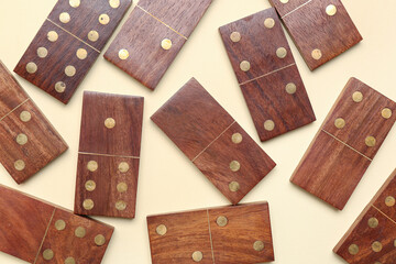 Wooden dominos blocks on beige background