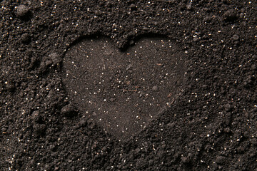 Heart made of black soil