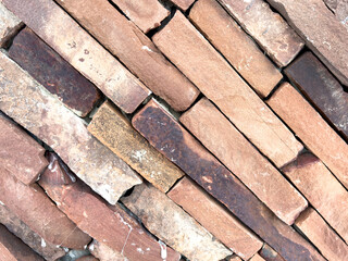 A brick wall with a brown and white color