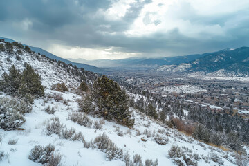 Fototapeta premium Winter Storm Over Mountain Range: Dramatic, Overcast Daylight