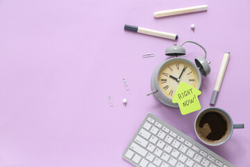 Sticky note with text RIGHT NOW, alarm clock, cup of coffee, stationery and keyboard on lilac...