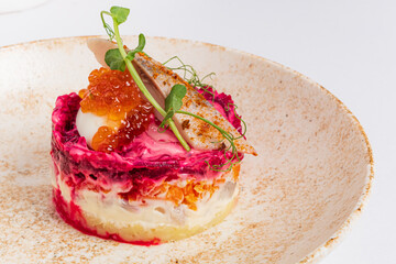 beetroot salad with herring and caviar