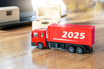 red cargo truck with 2025 New Year sign, Freight transportation, efficient transportation business...